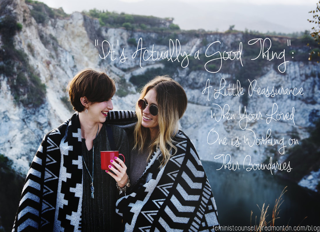 A picture of two women in a mountain landscape huddling under a blanket and laughing. Superimposed on the right, it says 